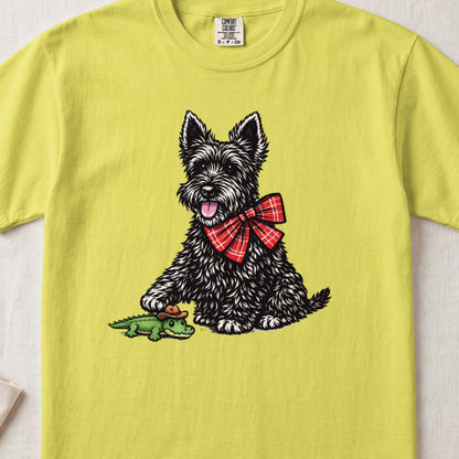 A chartreuse t-shirt featuring a graphic of a black terrier wearing a red plaid bow.