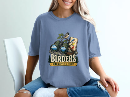 Binoculars, birds, and notebook graphic with text "BIRDERS YOU GOT ME HERE".