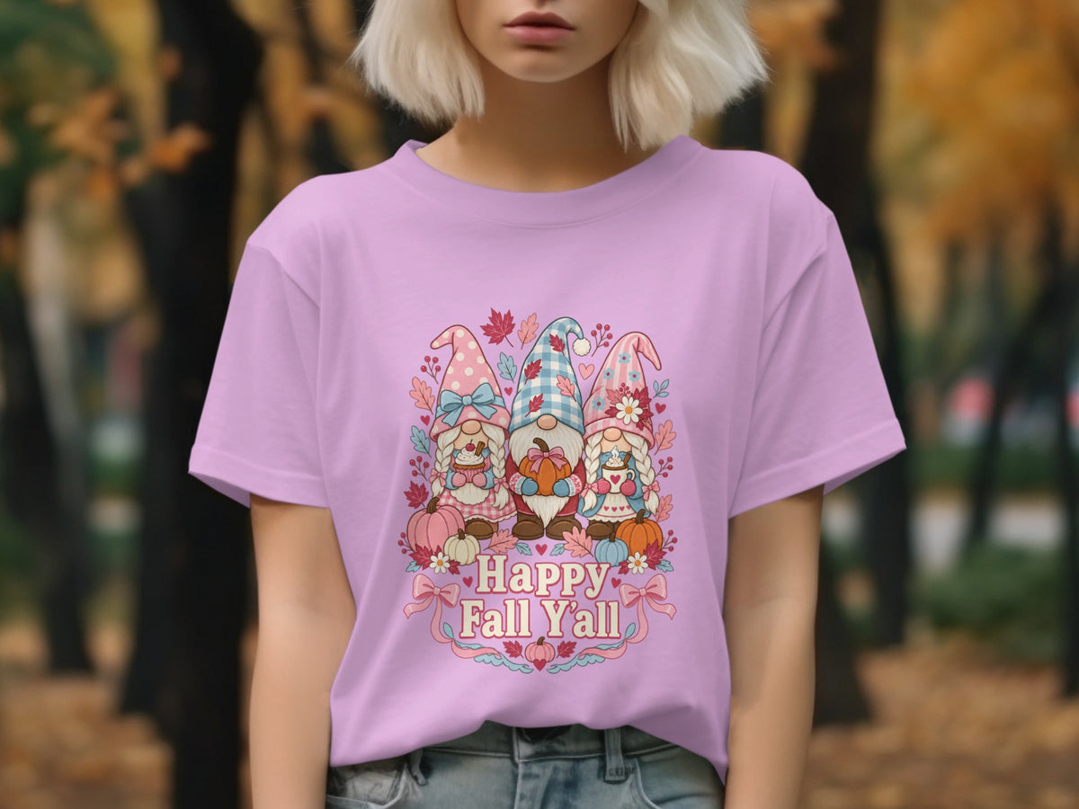 Three gnomes with pumpkins and autumn leaves, "Happy Fall Y'all" text on a pink shirt.