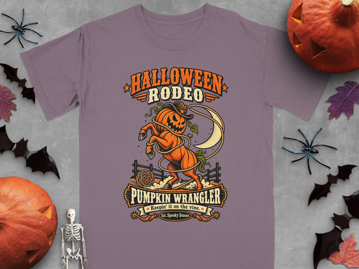Purple t-shirt with "Halloween Rodeo Pumpkin Wrangler" graphic.