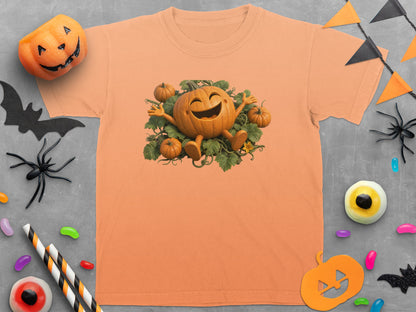 Orange t-shirt with a smiling cartoon pumpkin and smaller pumpkins design.