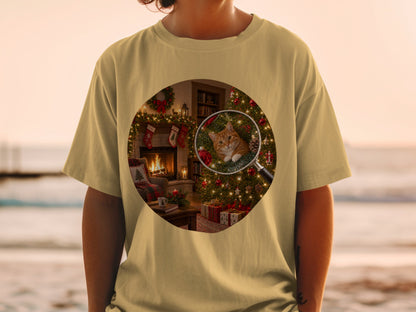 Cat in Christmas tree under magnifying glass on t-shirt design.