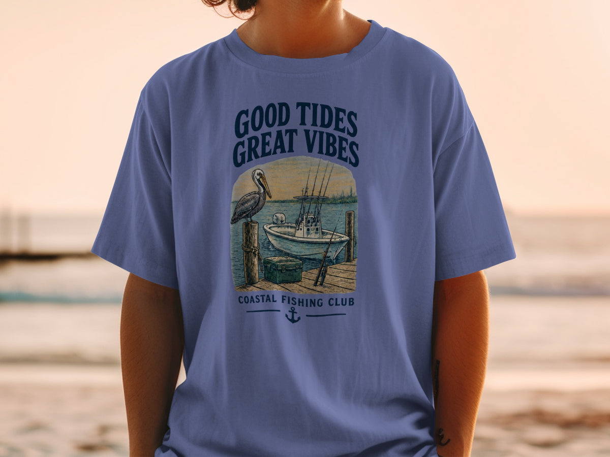 T-shirt with "Good Tides Great Vibes" and fishing boat graphic.