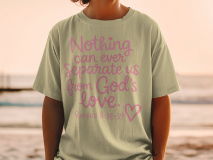 Light green t-shirt with pink text: "Nothing can ever separate us from God's love. Romans 8:38-39".