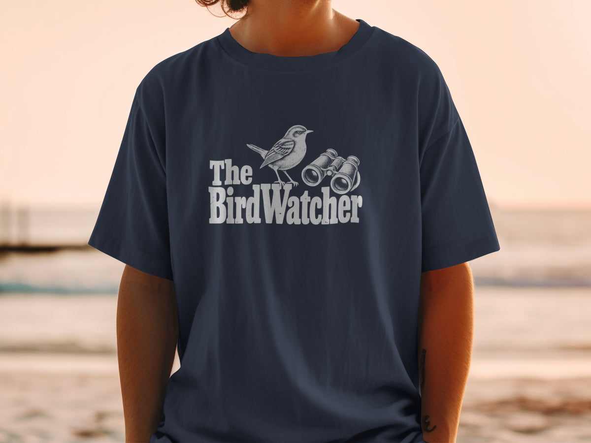 Navy t-shirt with a sketched bird and binoculars, reading "The BirdWatcher."