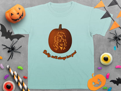 Light blue t-shirt with a carved pumpkin featuring Dolly Parton's face and text.