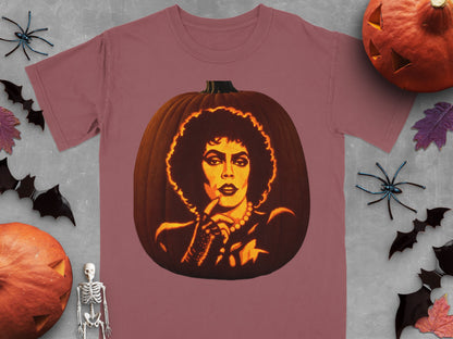 Mauve t-shirt featuring a lit jack-o-lantern carved with the face of Dr. Frank-N-Furter, surrounded by Halloween decorations.