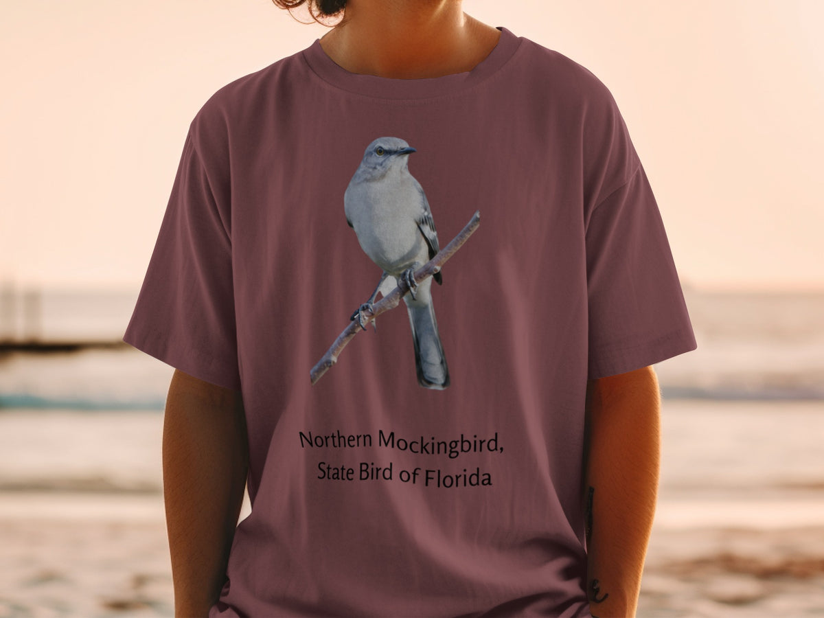 Northern Mockingbird, State Bird of Florida graphic on maroon t-shirt.
