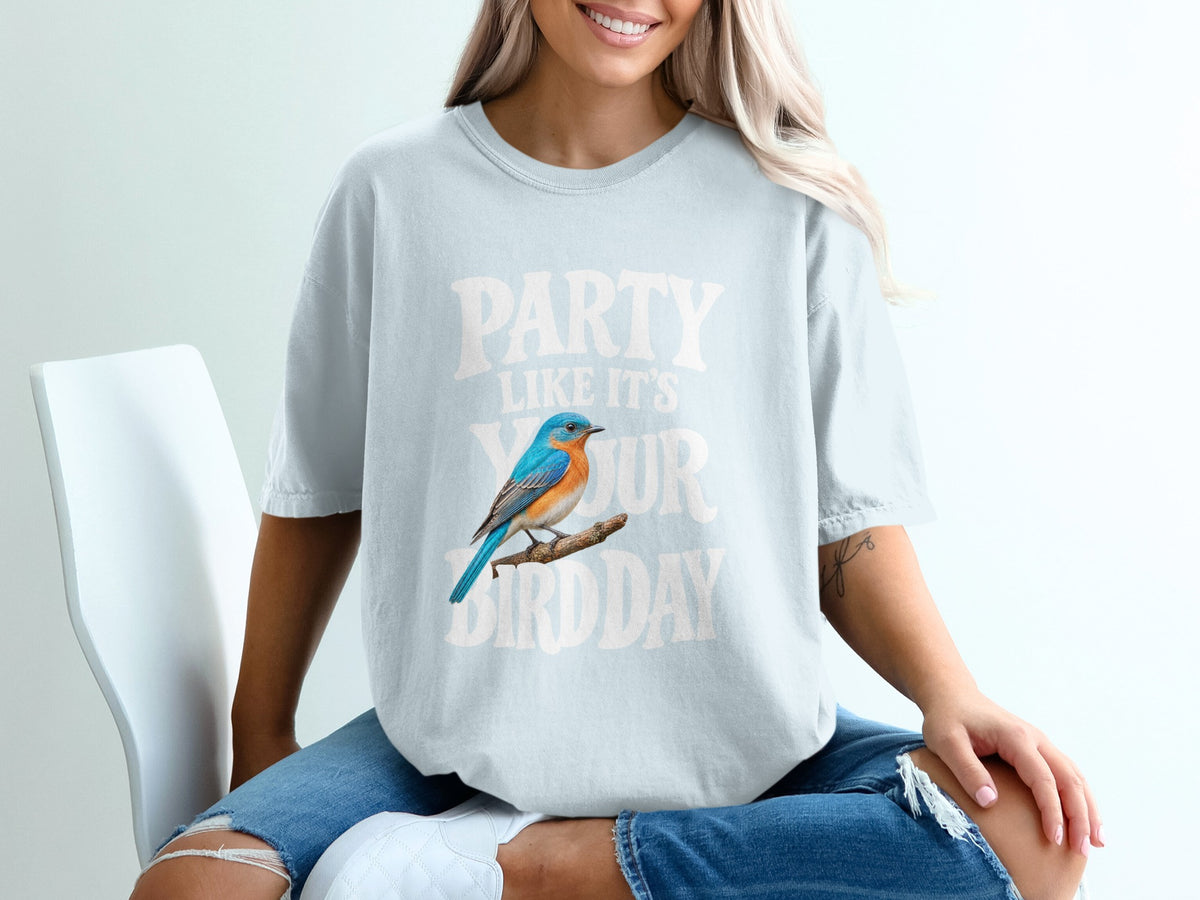 Light blue t-shirt with "PARTY LIKE IT'S BIRD DAY" text and a blue bird.
