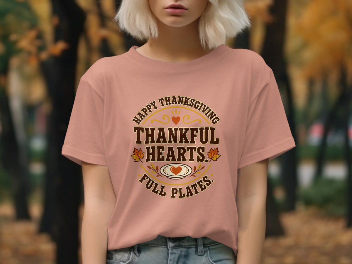 Thanksgiving t-shirt with "Thankful Hearts, Full Plates" text and festive graphics.