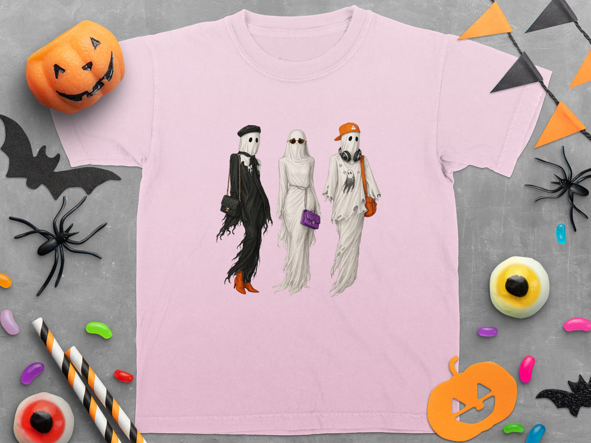 Pink t-shirt with three fashionable ghosts holding handbags and wearing accessories.