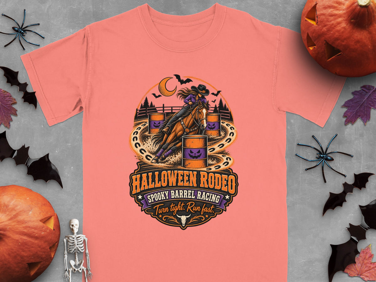 Halloween Rodeo spooky barrel racing graphic on a peach t-shirt.