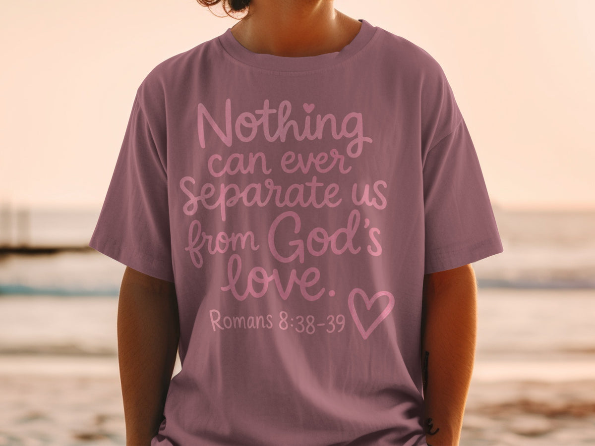 Purple t-shirt with "Nothing can ever Separate us from God's love. Romans 8:38-39" text.