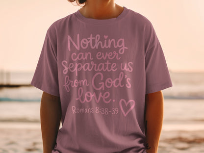 Purple t-shirt with "Nothing can ever Separate us from God's love. Romans 8:38-39" text.