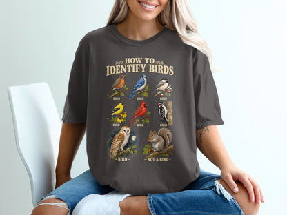 T-shirt graphic with "How to Identify Birds" text and illustrations of birds and a squirrel.