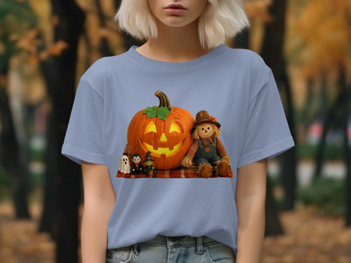 Halloween graphic on blue t-shirt: jack-o-lantern, scarecrow, witch, vampire, ghost.