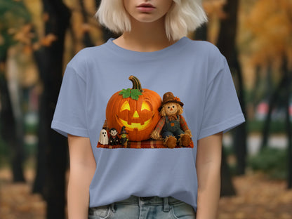 Halloween graphic on blue t-shirt: jack-o-lantern, scarecrow, witch, vampire, ghost.