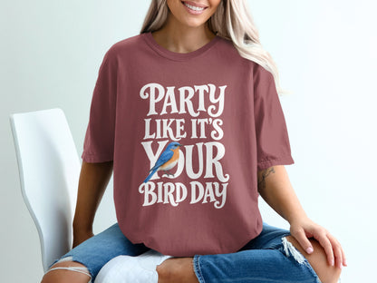 Maroon t-shirt with white text reading "PARTY LIKE IT'S YOUR BIRD DAY" and a bluebird graphic.