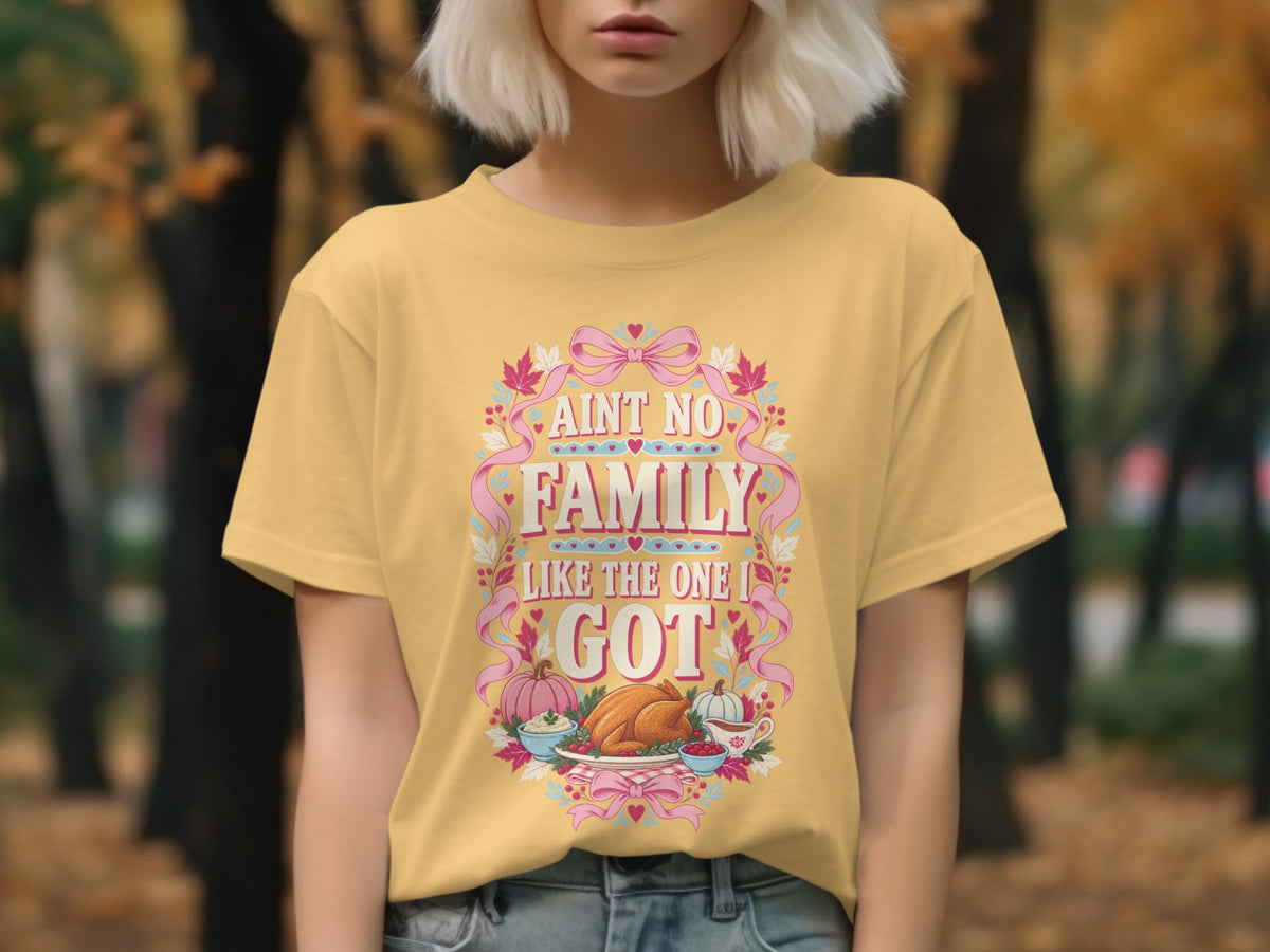 Yellow t-shirt with Thanksgiving graphic and text "Ain't No Family Like The One I Got".