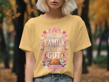 Yellow t-shirt with Thanksgiving graphic and text "Ain't No Family Like The One I Got".