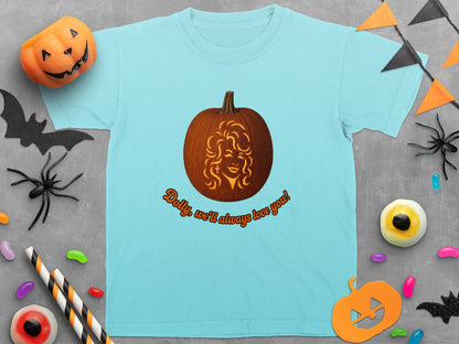 Light blue t-shirt with a carved pumpkin featuring Dolly Parton's face and text.