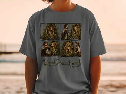 Four-panel comic on a t-shirt shows a dryad in a tree and a girl interacting, with text "Dryad Finds a Friend!"