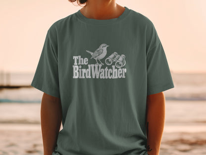 T-shirt with "The BirdWatcher" text, a bird illustration, and binoculars.