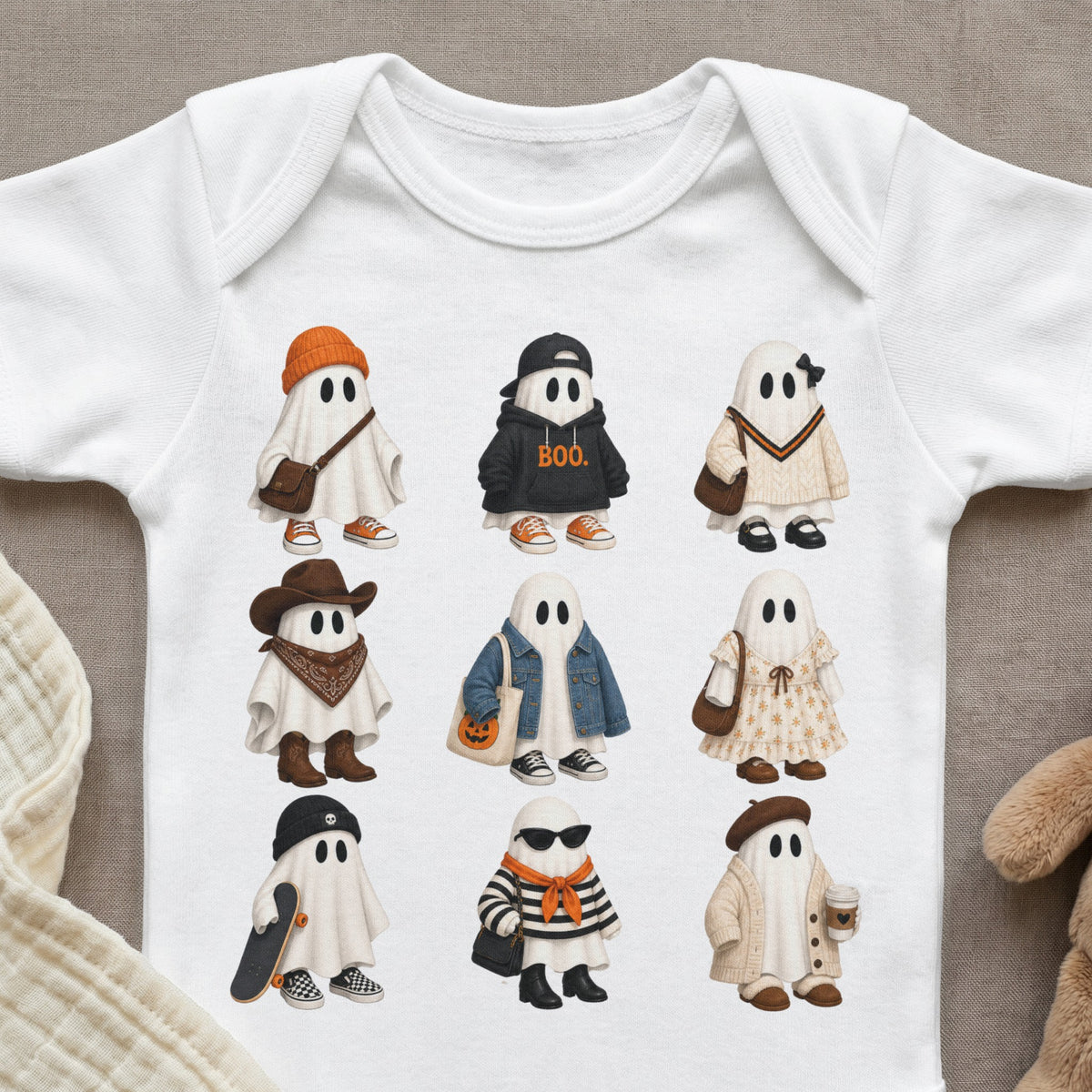 Nine cartoon ghosts in different outfits on a white onesie.