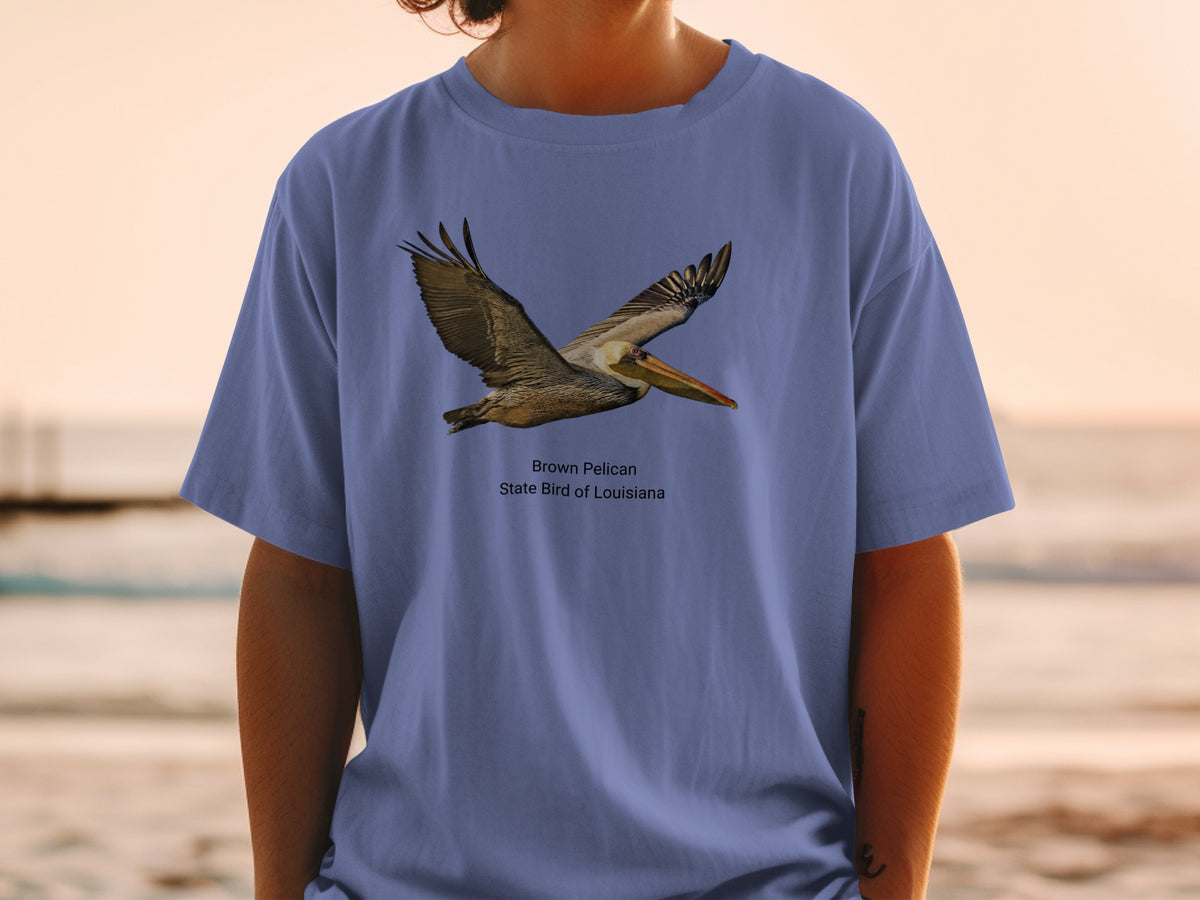 Brown Pelican State Bird of Louisiana graphic on a blue t-shirt.