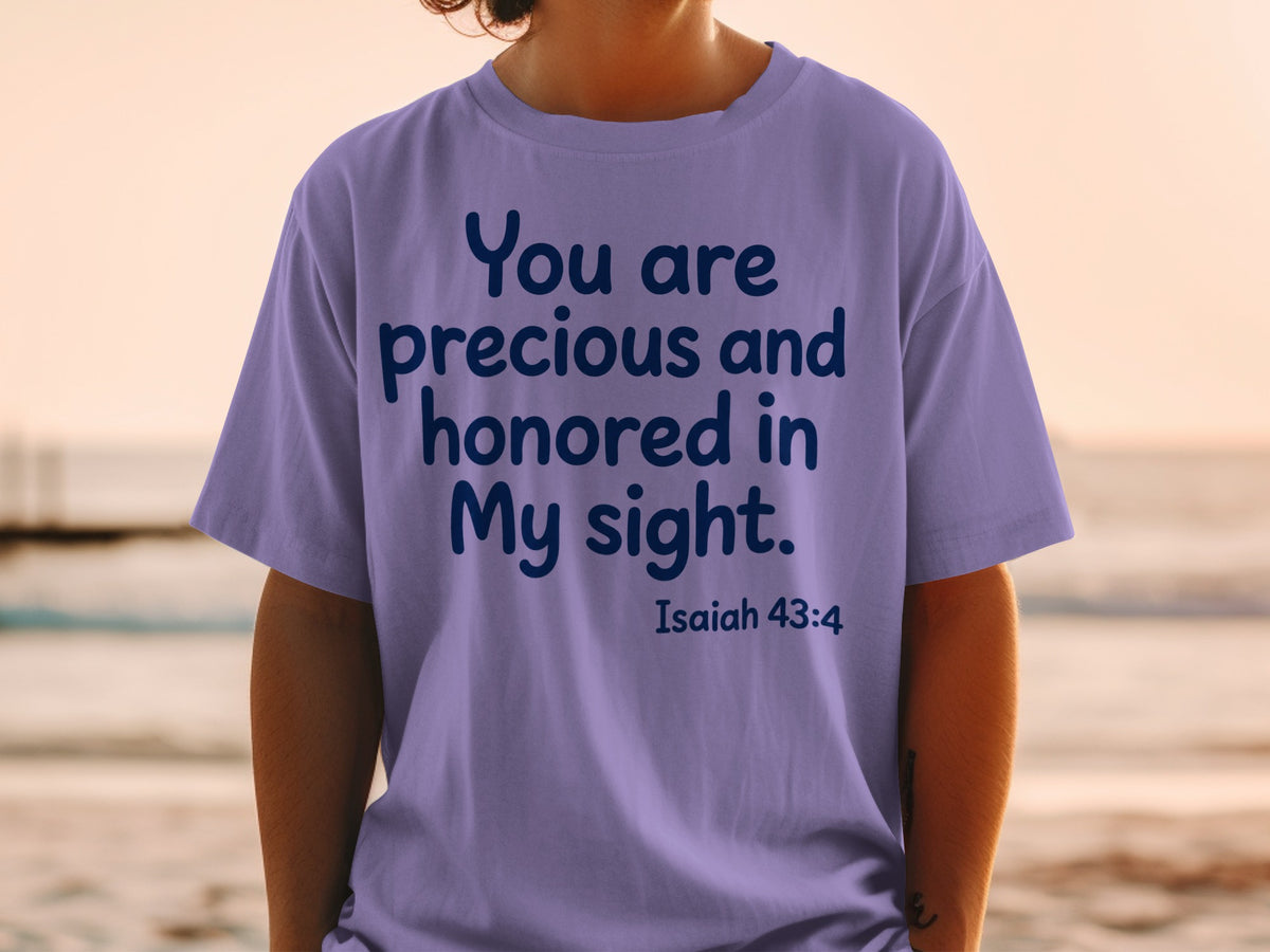 Purple t-shirt with "You are precious and honored in My sight. Isaiah 43:4" text.