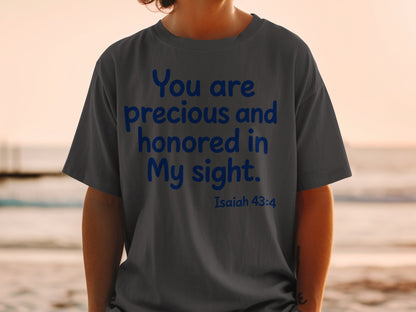 Dark grey t-shirt with blue text "You are precious and honored in My sight. Isaiah 43:4".