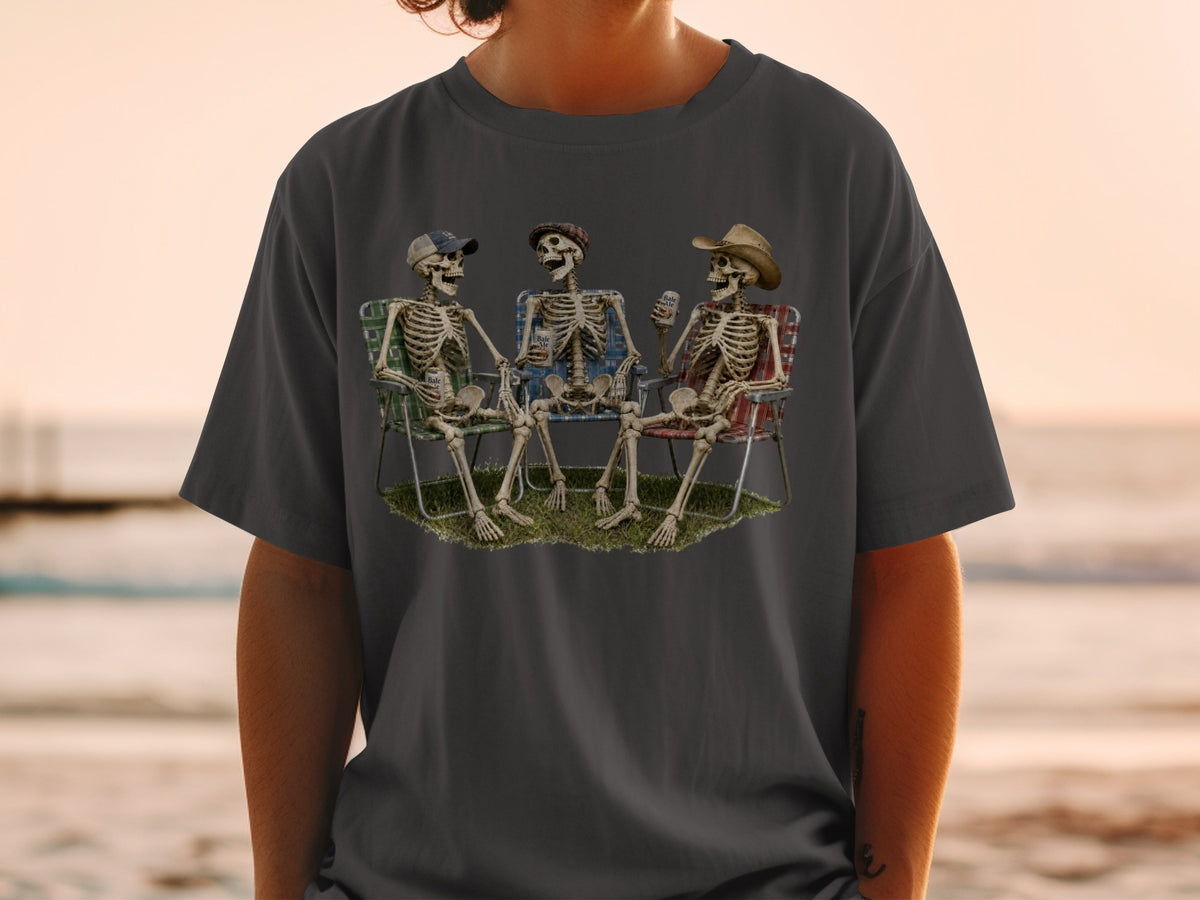 Three skeletons in camping chairs holding drinks with "Bale Ale" visible.