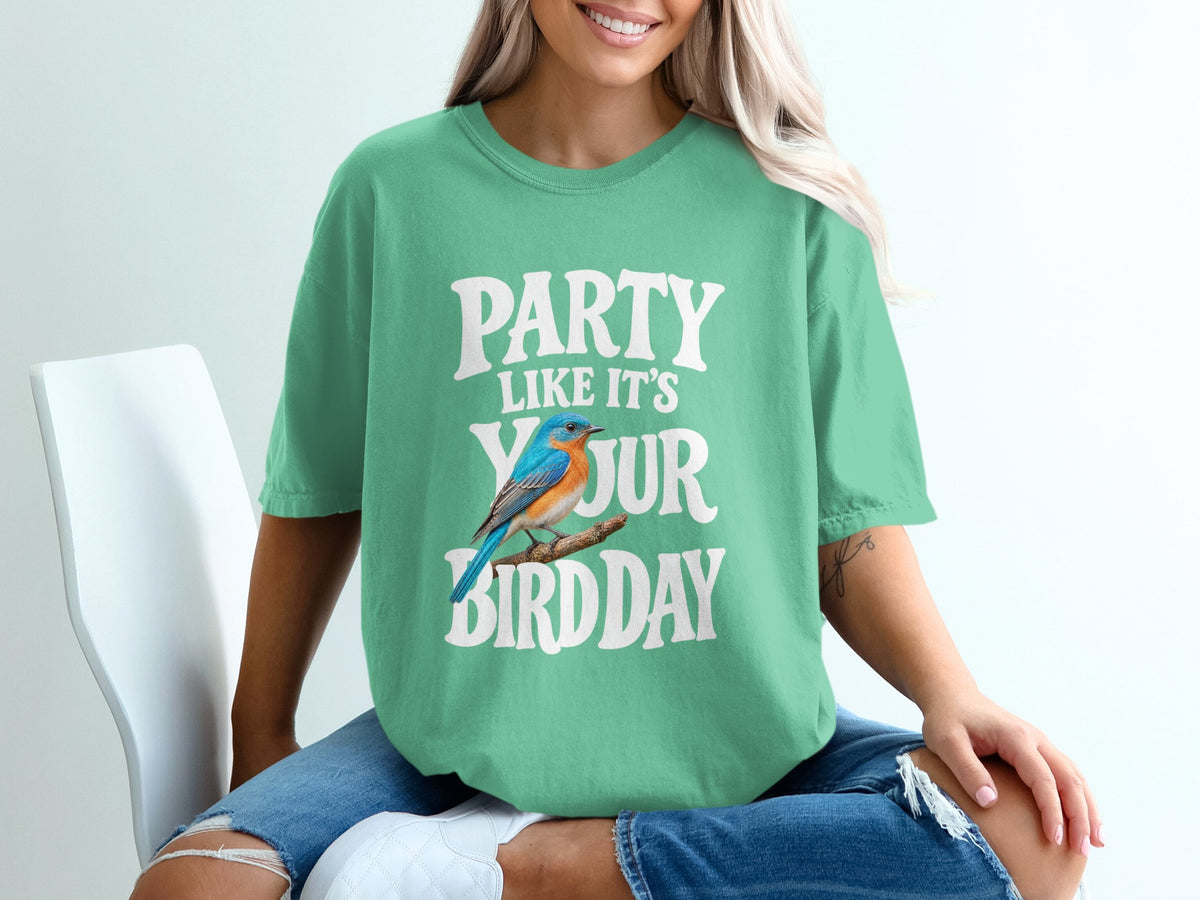 Green t-shirt with text "Party Like It's Your Birdday" and a blue bird.