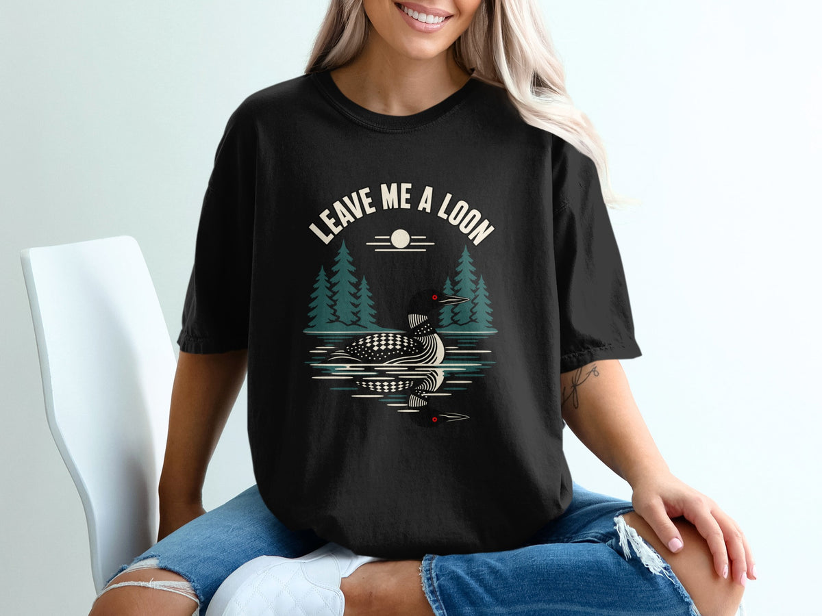 Black t-shirt with a loon graphic and "Leave Me A Loon" text.