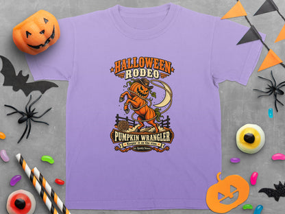 Purple t-shirt with Halloween Rodeo pumpkin wrangler graphic and text.