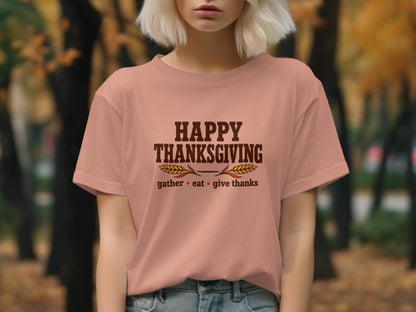 Peach t-shirt with "Happy Thanksgiving" text, wheat stalks, and "gather eat give thanks."