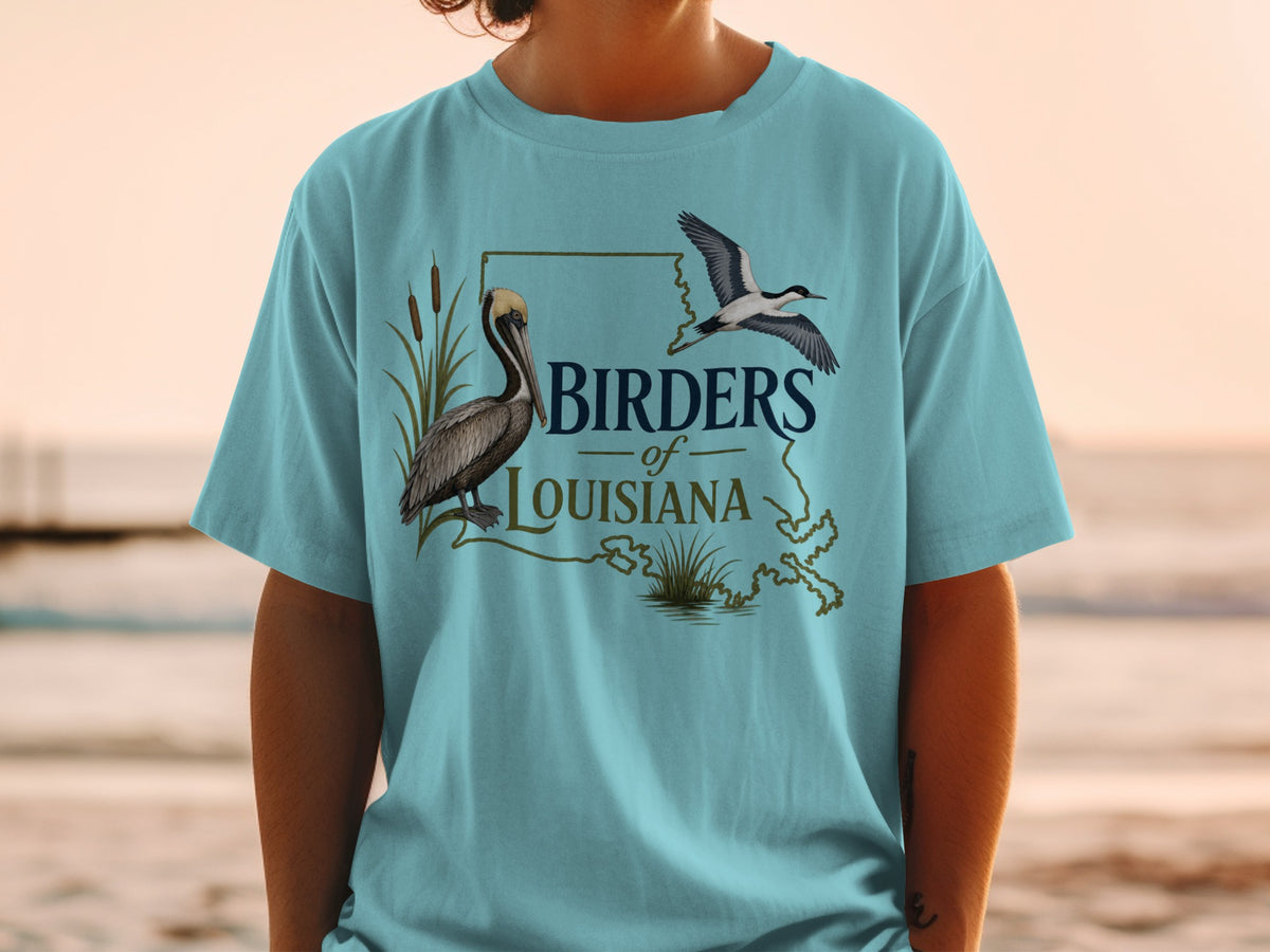 Birders of Louisiana t-shirt with pelican and flying bird over state outline.