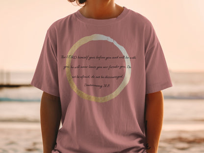 Pink t-shirt with Deuteronomy 31:8 verse printed inside a circular design.