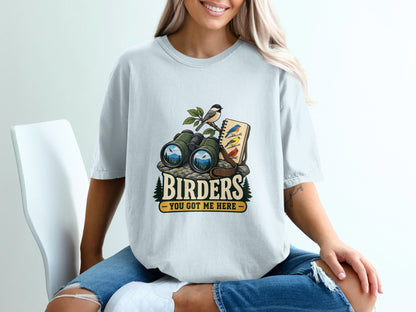 Birding graphic with binoculars, notebook, birds, and text "BIRDERS YOU GOT ME HERE".