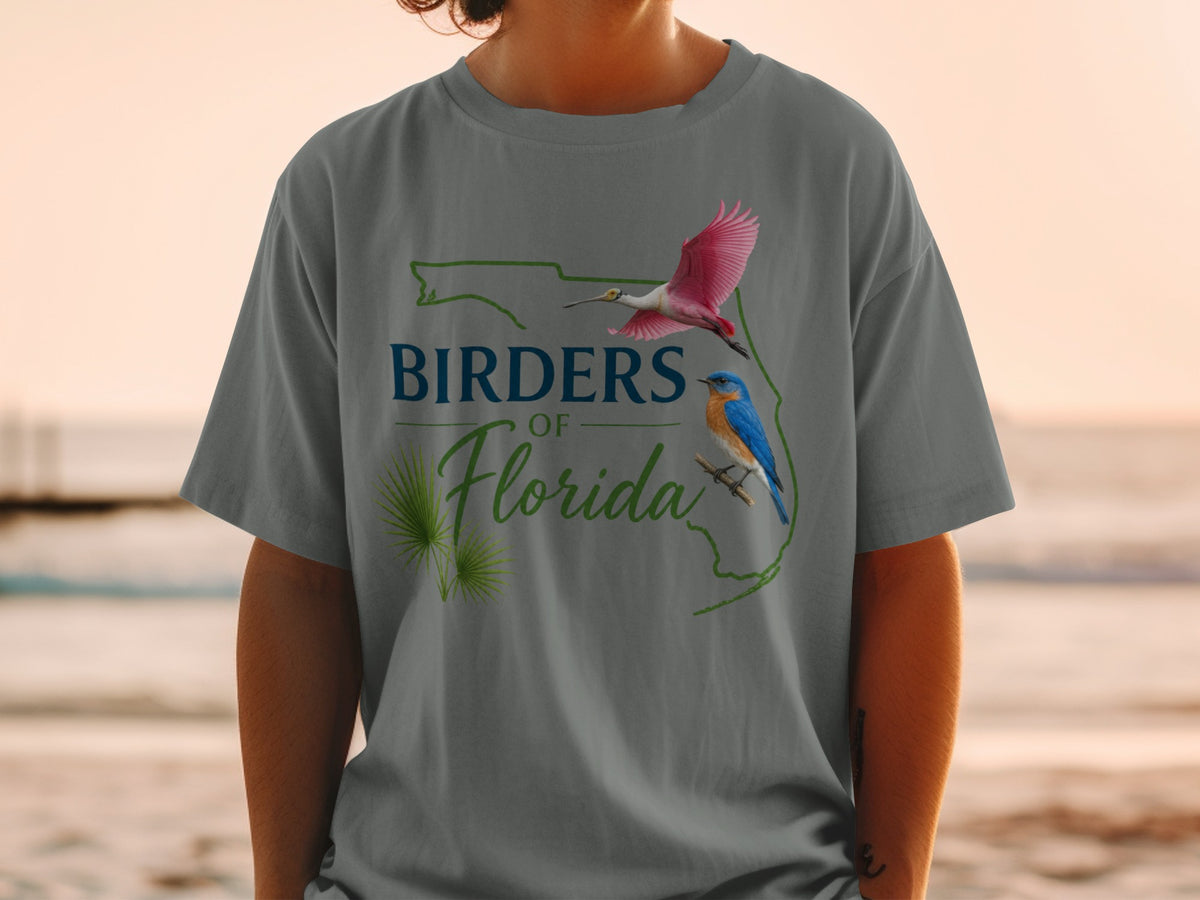 T-shirt with "Birders of Florida" text, a pink bird, and a bluebird.