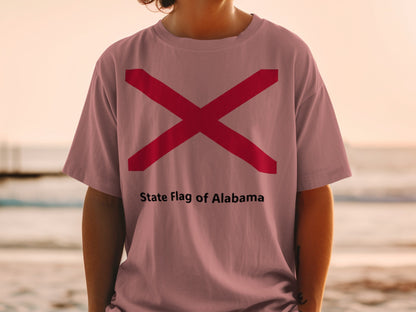 T-shirt with the State Flag of Alabama design, showing a red saltire on a pink shirt.