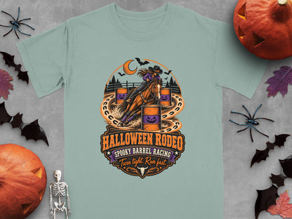 T-shirt graphic: Woman barrel racing a horse with Halloween rodeo text.