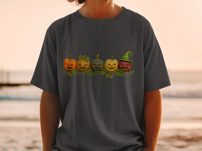 Five carved pumpkins with friendly faces and vine accents, one wearing a witch hat.