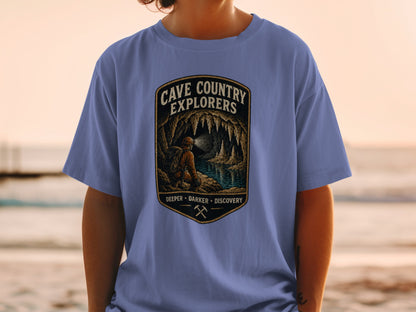Cave Country Explorers graphic tee with caver exploring a cave with stalactites.