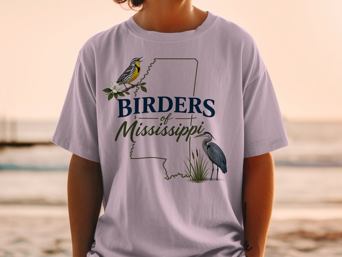 Birders of Mississippi t-shirt with warbler and heron artwork within state outline.