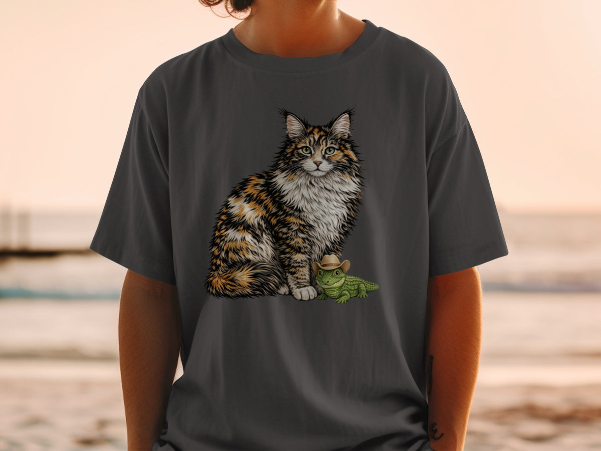 T-shirt with a graphic of a fluffy cat sitting next to a small alligator wearing a cowboy hat.