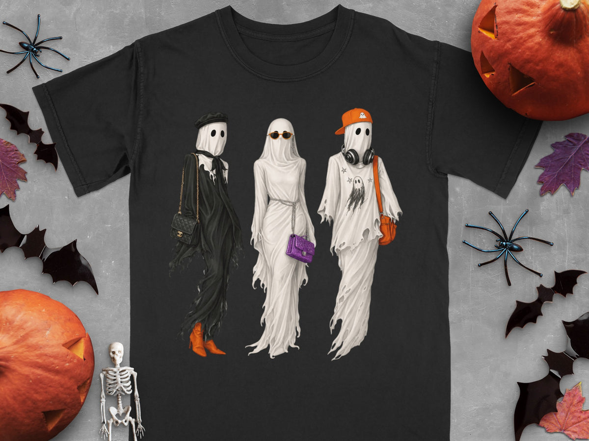Three ghosts dressed in fashionable outfits on a black t-shirt.