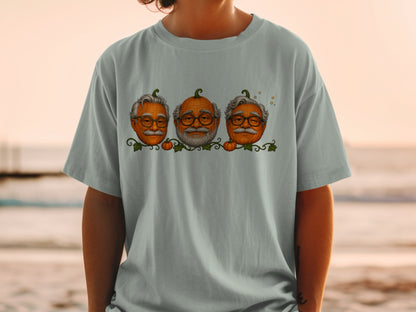 Three cartoon pumpkins with glasses and mustaches, on a vine.