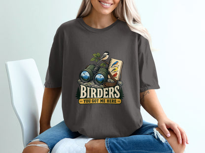T-shirt graphic with binoculars, birds, and text "Birders You Got Me Here".