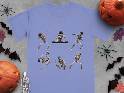 Skeletons dancing and DJing on a purple t-shirt with Halloween decorations.